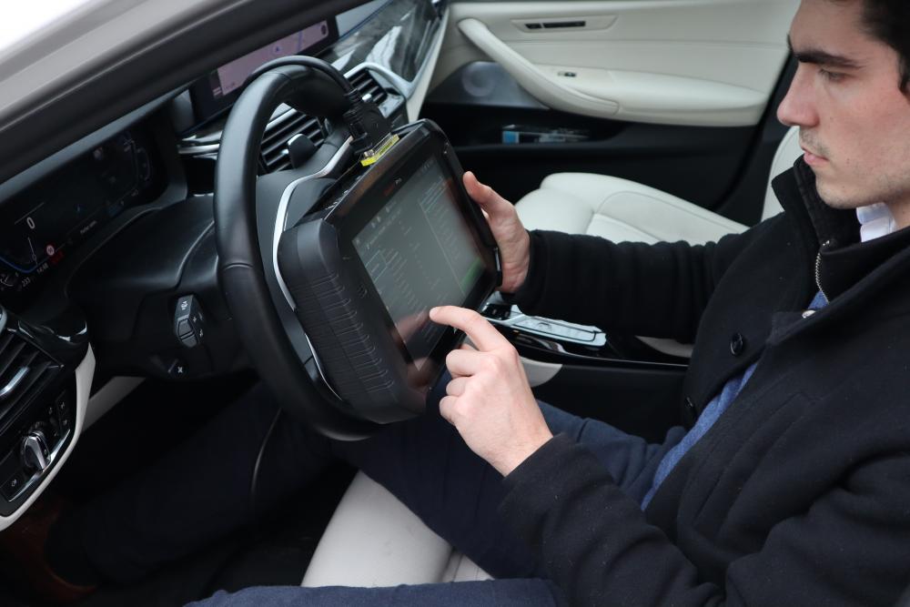 person sitting in car